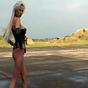 Perfect catwoman exposes her body