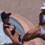 Horny lesbians doing tongue fuck in pool