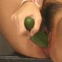 Teen plugs a huge cucumber in pussy
