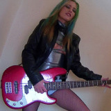 Stockings sweetheart plays with pussy and guitar